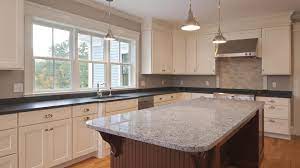 Choosing a different colored cabinet or counter top for the kitchen island is on trend! Photos Proof Your Kitchen Countertops Don T Have To Match Sheknows