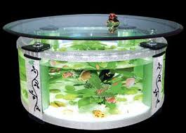The fish tank table is made even more alluring & dramatic because of its blue glass gravels that create a unique illumination. Table Aquarium Fish Tank Kids Art Decorating Ideas Fish Tank Table Glass Fish Tanks Aquarium Coffee Table