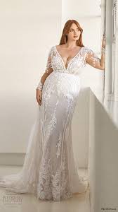 Fitted deep plunge wedding dress with handmade beading. Ashley Graham X Pronovias 2020 Wedding Dresses A Gorgeous New Size Inclusive Bridal Collection Wedding Inspirasi Plus Wedding Dresses Wedding Dress Long Sleeve Fitted Wedding Dress