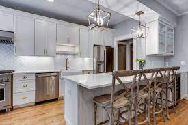 Notice in this kitchen the cabinets don't go all the way to the end of the peninsula so here the backsplash tile could have been installed beside the cabinet up to the crown moulding for a more the first kitchen jan and i designed together many years ago had a peninsula with upper cabinets! No Room For A Kitchen Island Add A Peninsula To Your Kitchen Dura Supreme Cabinetry