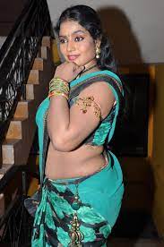 This doodhwali aunty wears an indian sari and blouse. Jayavani Hot Photos Minugurulu Audio Launch New Movie Posters
