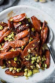 Maple Bourbon Glazed Carrots With Pistachios And Sea Salt Recipe Glazed Carrots Maple Glazed Carrots Maple Bourbon Glaze