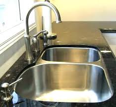 remove kitchen faucet in 4 easy steps