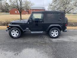 Image result for Brilliant Black 2005 Jeep