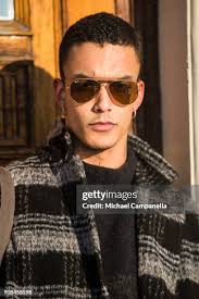Lucas Graf wearing RayBan sunglasses with a coat from Weekday during...  News Photo