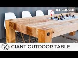 Simple wood pallet dining table set: Giant Outdoor Dining Table With Cooler How To Woodworking Youtube Rustic Outdoor Dining Tables Outdoor Dining Dining Table