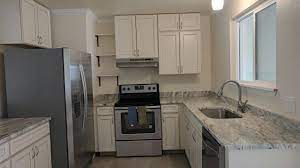 Find door & trim paint at lowe's today. Caspian Cabinets From Lowe S Sherwin Williams Steamed Milk Paint Color Glacier Sands Marble Counterto Kitchen Cabinet Colors Kitchen Remodel Kitchen Renovation