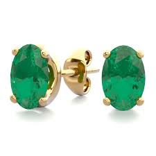 Each earring consists of a piece of raw emerald that is attached to a surgical steel post and is make your outfit pop with a touch of natural beauty by accenting it with these raw gold and emerald earrings. 1 Carat Oval Shape Emerald Stud Earrings In 14k Yellow Gold Over Sterling Silver Superjeweler