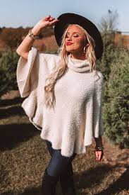 Complete the ensemble with flip flops and a shell necklace. Cozy Aesthetic Knit Sweater Impressions Online Boutique Page 1