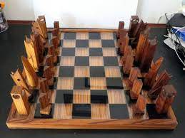 So, who was responsible for creating the standard that is acknowledged as the mid century modern chess set today? Wood Chess Set In Teak And Rosewood With Teak Storage Box And Teak And Lucite Board Wood Chess Chess Set Modern Chess Set