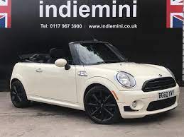 What should i look for in a 2018 mini cooper? All White Mini Cooper Cab Great Condition This Funky Mini Cooper Convertible Cab Comes With Black Wheels White Mini Cooper Mini Cooper Convertible Mini Cars