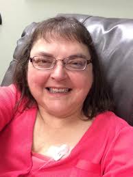 Cleo is staying close by, keeping me safe and warm during my infusion today.