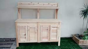 The deluxe potting bench with cabinet is packed with features and functionality. Custom Raised Gardens Potting Benches