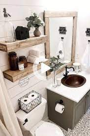 Bathroom wall decorating ideas small bathrooms by pupun purnama june 25, 2021 small bathroom ideas small bathroom ideas and designs photo gallery 20 small bathrooms small bathroom ideas bob vila Bathroom Decorating Diy Ideas Storage Vanity J Aime L Armoire Grise Avec Le Miroir En Bois Diy Bathroom Bathroom Decor Diy Bathroom Storage