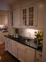 What color cabinet goes with black granite? Modern Kitchen Design With Black Granite Novocom Top