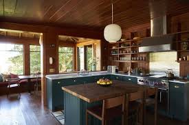 Contemporary Midcentury Modern Kitchen With Dark Teal Blue Cabinets And Butcher Block Counter And Open Upp Modern Small House Design Maine House Cabin Kitchens