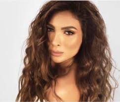 ساندرين الراسي في كليب جديد، واطلالة بتوقيع اندريه غورغيان.