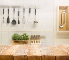 One has to come up with the style, size and pattern that best fits the kitchen, then adapt the desired form to technical details such as measurement, weight, dimensions and building ratio while keeping in. Wood Table Top On Blur Kitchen Room Background For Montage Product Stock Photo Picture And Royalty Free Image Image 117027774