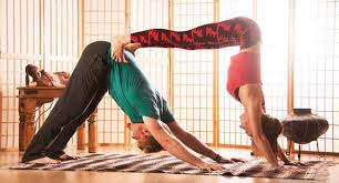 Partner a sits with legs crossed and brings hands behind hips opening up the heart. Couples Yoga Beginner Poses Yoga Life