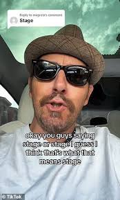 Couple shares a terrifying video of a female car passenger desperately  'signaling for help' using domestic violence sign as they drive past her