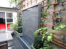Patio Realise Par L Entre Prise Didier Danet Mur D Eau En Zinc Jardiniere En Zinc Dalle Granit Jasmin Etoile Hydrangea Liriope Helxine Prele Plants