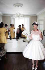 The 15 Prettiest Polka Dot Wedding Dresses For The Girly Bride Wedpics Blog Polka Dot Wedding Dress Tea Length Wedding Dress Wedding Dresses 50s
