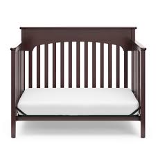 The crib's roomy style, with dimensions of 57 inches long and 43 inches wide, will provide your child with a safe environment to sleep and play while they grow. Graco Lauren 4 In 1 Convertible Crib Storkcraft