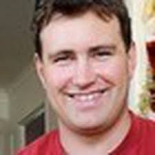 Dad happy at home with kids