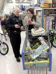 Shop with a Cop Cecil Township police help youngsters select gifts for  Christmas