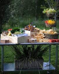 Pauline And Peter S Rustic Rehearsal Dinner In Sun Valley Idaho Rehearsal Dinner Decorations Rustic Rehearsal Dinners Food Display Table