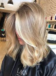 Long layers are cut around the side and back of these locks to lighten the length enhancing the movement of the soft waves and encouraging the bounce. 60 Amazing Blonde Highlights Ideas For 2021 Belletag