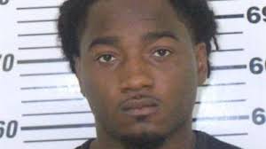 Man fatally shot at 8-year-old son's funeral; suspect held