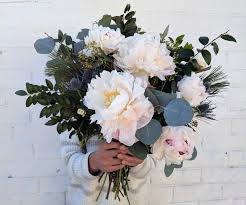Peonies Are Coming To Town That S Right You Can Wear Your Favorite Holiday Sweater And Enjoy Your Favorite Seasonal Flowers Flower Centerpieces Month Flowers