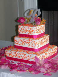 Serving Hands Weddings And Flowers Wedding Cakes Orange And Pink Wedding Orange Wedding Cake Wedding Cake Topper Decorations