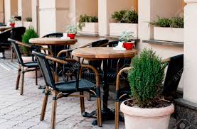 Check spelling or type a new query. Open Restaurant Terrace With Wooden Tables And Chairs Decorated Green Plants In Pot Stock Photo Picture And Royalty Free Image Image 76903594
