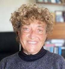 CL A U D I A CO M I N O T T I