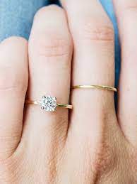 How Much Should You Really Spend On An Engagement Ring Via Whowhatwear Half Carat Engagement Rings Womens Engagement Rings Unique Engagement Rings