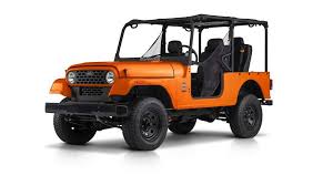 New toyota 6 cylinder land cruiser with differential lock, beige interior and automatic gearbox. Mahindra Roxor New Mahindra Roxor Gets A Grille Like Old Toyota Land Cruiser Fj Auto News Et Auto