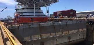 Dry dock, type of dock (q.v.) consisting of a rectangular basin dug into the shore of a body of water and provided with a removable enclosure wall or gate on the side toward the water, used for major repairs and overhaul of vessels. South African Drydock Undergoes Overhaul Safety4sea