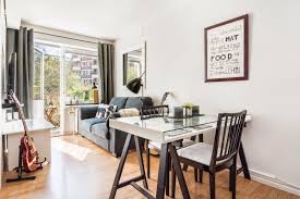 All the dining tools you'd like to conceal are kept out of sight. Sunny Tiny Ground Floor Apartment With Complementary Outdoor Living Space