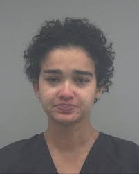 Woman arrested for pointing gun at son's father