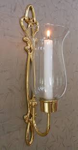 Browse a large selection of wall sconces on houzz, including unique, modern and traditional designs in a variety of finishes and colors. Brass Sconces Cast Brass Sconces And Wall Sconces In Gold Finish Candle Wall Sconces Candle Sconces Decorative Wall Sconces