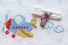 * baby cross stitch patterns mix 1. Embroidery With Baby S Motifs Airplane And Umbilical Cord Stock Photo Picture And Royalty Free Image Image 85104787