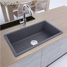 Undermount sinks are mounted from below the countertop, leaving you with a flawless countertop surface, meaning you won't have any water or debris caught on the edge of the sink (and possible collecting bacteria), and making it easier to clean. China Best Seller Kitchen Product Granite Undermount Sink Grey Sink China Kitchen Sink Sink