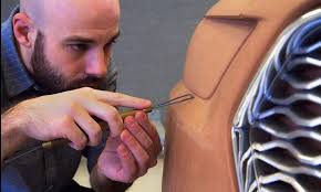 Grad lands job where his professor helped design Mustang logo