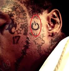 The spider web means that the wearer has done time (in prison). Lil Wayne S 86 Tattoos Their Meanings Body Art Guru