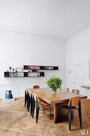 Each piece is made from metal with engineered wood surface details. 11 Minimalist Dining Rooms With Big Impact Architectural Digest