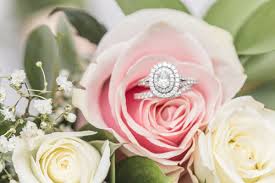 Halo Ring In Bouquet Macro Fresh Flower Bouquets Halo Oval Engagement Ring Bouquet