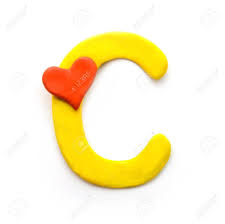 It is a return to the essence and purpose of one's life. Yellow Plasticine Letter C English Alphabet With Red Heart Meaning Love On Valentine S Day Isolate On White Background Stock Photo Picture And Royalty Free Image Image 115449273