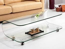 Need a coffee table that includes storage…and is portable? Glass Coffee Table With Wheels